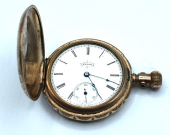 Antique 1877 Elgin Pocket Watch Etched Gold case 7j jewel serial # 485959 finish is Gult on brass