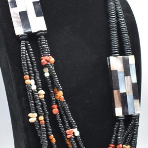 Statement necklace with various shell, black Puka and coral beads and natural materials, Three strand statement Necklace Mother of Pearl