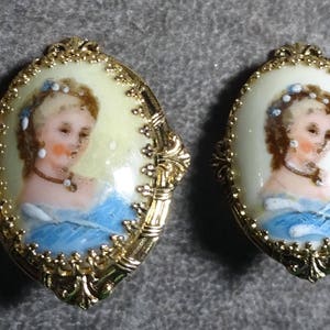 Karu Signed Limoge France hand-painted porcelain Lady in blue clip earrings, clip back, lovely breasts setting