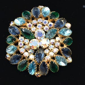 Unusual Aurora borealis Blues and Green Rhinestone Brooch Kramer/Weiss style of setting Prong set, Open back stones