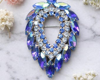 Sarah Coventry Blue Lagoon strass broche AB blauw