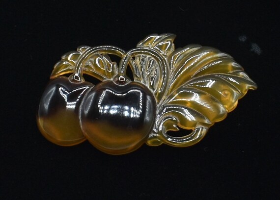Bakelite Brooch Translucent amber cherries Figura… - image 3