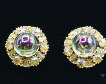 Beautiful Carnival glass earrings Marble like center stone iridescent