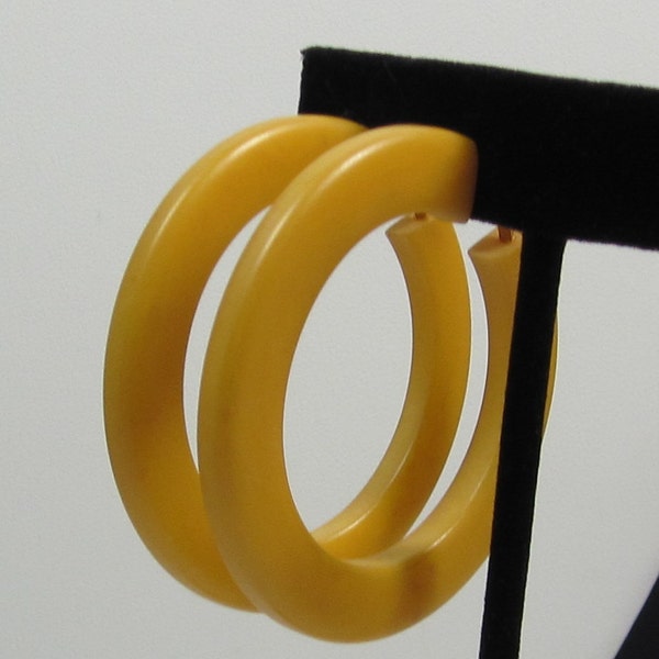 Huge Mustard Colored Bakelite Hoop Clip Earrings