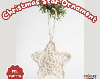 May include: A cream-colored, crocheted star ornament hanging from a pine branch. The star has a loop for hanging and is made with a textured stitch. Text on the image reads "Christmas Star Ornament" and "PDF Pattern".