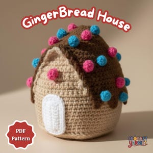 May include: A crocheted gingerbread house with a brown roof and tan walls. The roof is decorated with pink and blue pom-poms. The text "GingerBread House" is above the house, and "PDF Pattern" is in a red badge.