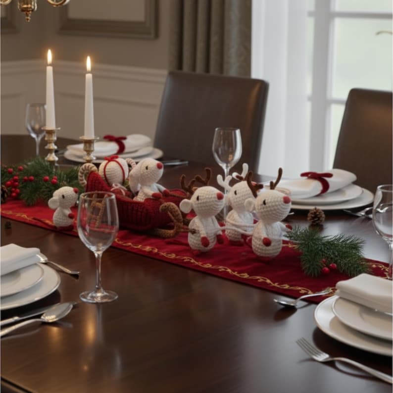 May include: A festive dining table setting with a red runner, white plates, and wine glasses. Crochet reindeer and a sleigh are the centerpiece, with lit candles and greenery adding to the holiday theme. The table is set for a special occasion.