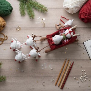 May include: A festive crochet scene featuring a red sleigh pulled by four white reindeer with brown antlers. The sleigh is filled with gifts and a Santa figure. Yarn, pine needles, and crochet hooks surround the scene, creating a holiday theme.