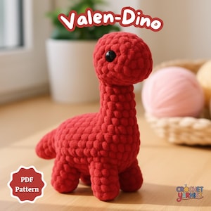 May include: A red crochet dinosaur toy with a long neck and small tail. The dinosaur has a round head with a black eye. The text "Valen-Dino" is above the dinosaur, and "PDF Pattern" is in a red badge.