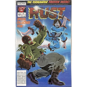 May include: Comic book cover for "Rust" featuring a battle scene with two figures. One figure is in blue, wielding a sword, and the other is a green, zombie-like character. The cover includes text: "The Terminator Preview Inside!" and "Special Collectors Item!"