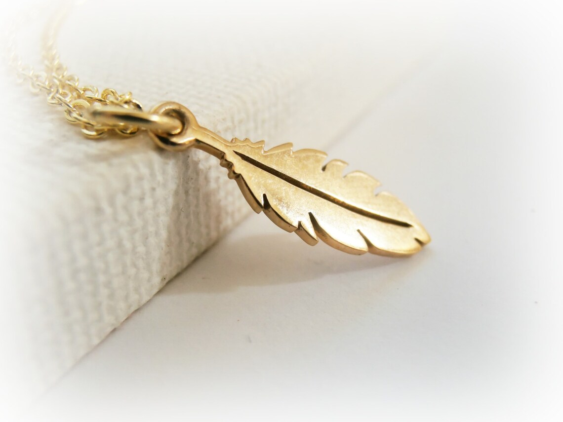 Mystical feather charm necklace