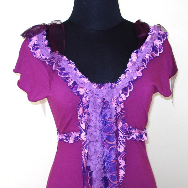 a vibrant violet sassy sexy bohemian gypsy gothic dress with heavily embroidered trim...