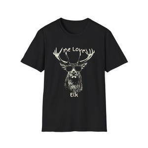 May include: Black t-shirt featuring a graphic of an elk wearing sunglasses. The text "Me Love" arches above the elk's antlers, and the word "Elk" is printed below the elk's face. The design is in white.