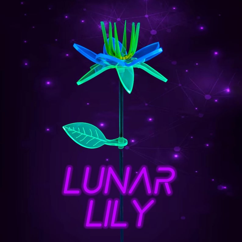 May include: A glowing flower sculpture with translucent blue petals and bright green stamen and leaf, mounted on a thin stem. Below the flower, the text LUNAR LILY is displayed in a vibrant purple neon font against a dark purple background.