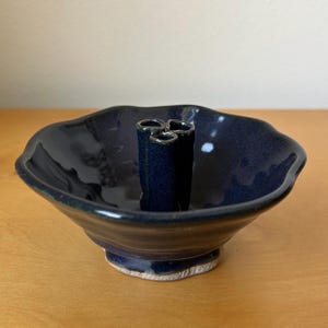 vintage handmade small ceramic Ikebana bud vase shallow bowl 5“ wide x 2.5” tall navy blue stoneware wavy edge Otter Woods Pottery Oregon