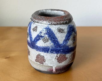vintage tiny raku fired studio pottery pot or pen cup 3.5” tall hand decorated with dots and cobalt blue triangles abstract design signed