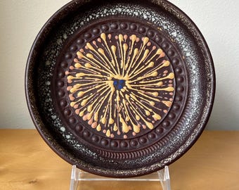 vintage Silberdistel wall plate shallow bowl 8“ diameter rustic dark brown yellow starburst West German MCM mid-century modern pottery