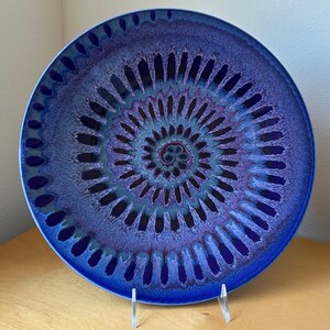 vintage Matthew Patton ceramic decorative plate 12.5” diameter hand painted deep blue purple psychedelic spiral op art signed studio pottery