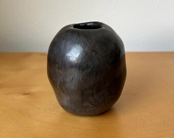 vintage pit fired miniature pinch pot 3.5” tall black burnished smooth surface and small mouth opening signed Lam