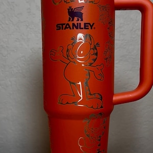 Laser Engraved Orange Cat 80s cartoon 30oz Stanley Tumbler