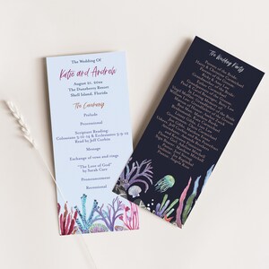 May include: A wedding ceremony program with a blue and white background featuring a coral reef illustration. The program lists the wedding ceremony order, including the scripture reading, message, exchange of vows, and recessional. The text "The Wedding of Katie and Andrew" is printed in pink at the top of the program.