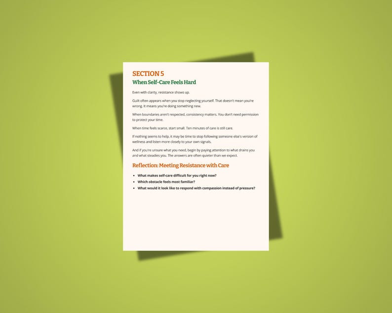 May include: A white sheet of paper with text on a green background. The text reads "SECTION 5 When Self-Care Feels Hard" and includes bullet points about self-care. The paper is slightly angled, casting a shadow.