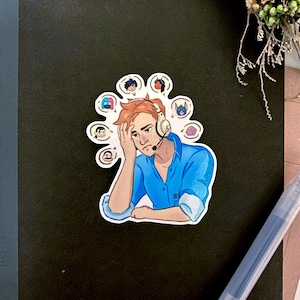 May include: A sticker featuring a cartoon illustration of a person with red hair wearing a headset, looking stressed. The person is surrounded by thought bubbles with various character faces. The person is wearing a blue button-down shirt.