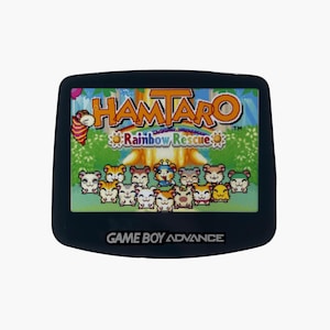 Hamtaro Rainbow Rescue-magneet | Handgemaakte kawaii-pixelkunst | Zwarte Game Boy Advance | Schattig geeky cadeau