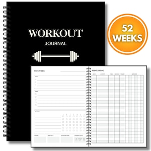May include: A black spiral-bound workout journal with white text reading WORKOUT JOURNAL and a barbell icon. An orange circular badge displays 52 WEEKS. The open interior shows a white page with sections for weekly goals, tasks, trackers, and a fitness log.