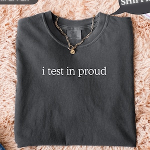 May include: A rustic wooden sign with the text "Welcome to our home" in white lettering. The sign features a distressed finish and a simple, inviting design, perfect for front door decor.