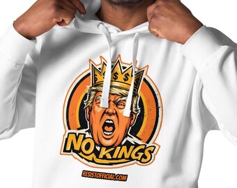 Pode incluir: Moletom branco com um gráfico de um homem usando uma coroa e as palavras "NO KINGS". O gráfico é laranja e preto. O endereço do site resistofficial.com está na parte inferior do gráfico.