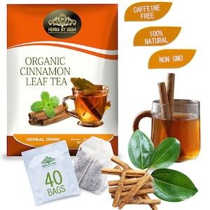 May include: An orange and white package of organic cinnamon leaf tea with a cup of tea, cinnamon sticks, and tea bags. The package reads "Organic Cinnamon Leaf Tea" and "Herbal Drink". The image also includes labels that say "Caffeine Free", "100% Natural", and "Non GMO".