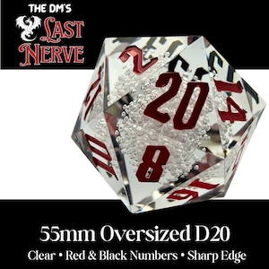 May include: A clear, oversized D20 die with red and black numbers. The die is 55mm in size and features sharp edges. The text "THE DM'S LAST NERVE" is in the upper left corner.