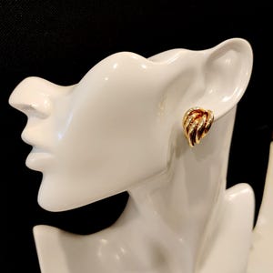 1980s curved  14k gold  5 strand half hoop post earrings.