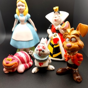 Disney&#39;s &#39;Alice in Wonderland&#39; Alice, Queen of Hearts, White Rabbit, Cheshire Cat and March Hare.