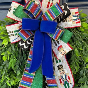 Nutcracker Christmas Bow. Blue Velvet Bow. Door Hanger Bow. Holiday Door Wreath Bow. Lantern Bow with Nutcracker Ribbon. Nutcracker Tree Bow