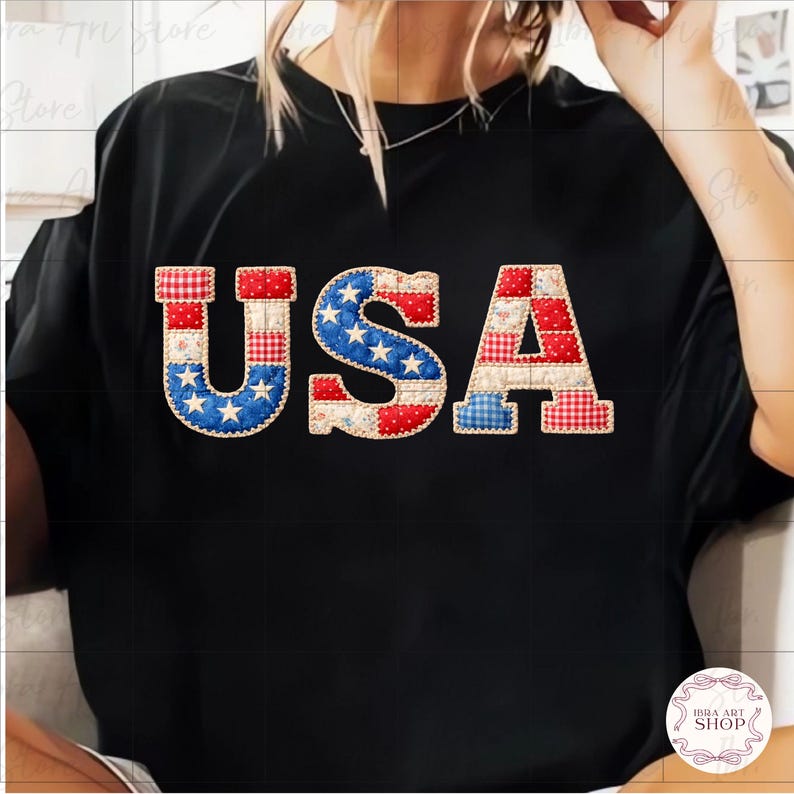 May include: Black t-shirt featuring the word "USA" in a patchwork design. The letters are decorated with red, white, and blue patterns, including stars and stripes, reminiscent of the American flag. The shirt is a casual style.