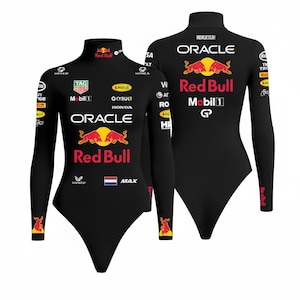 May include: Black long-sleeved bodysuit featuring the Red Bull logo and sponsor branding. The bodysuit has a mock neck and is adorned with the Oracle and Mobil 1 logos. The design includes a Dutch flag emblem and the text "MAX".