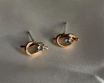 Vintage Gold Tone Blue Rhinestone Knot Earrings