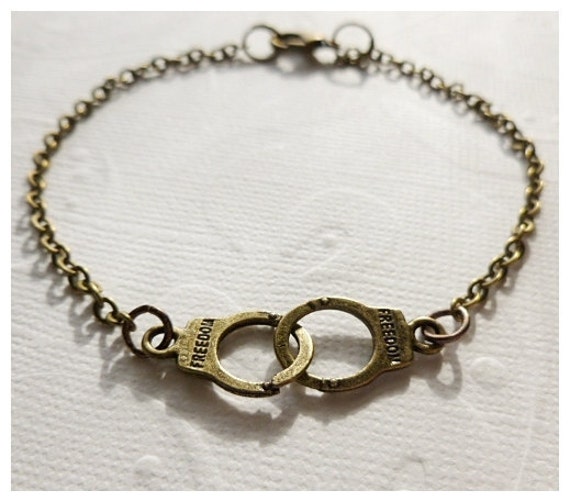 Items similar to Handcuff Charm Bracelet on Etsy