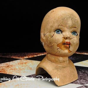 blue eyed creepy doll art photo,  spooky broken doll, scary nightmare art, haunted dreams, bewitching beauty, dark art