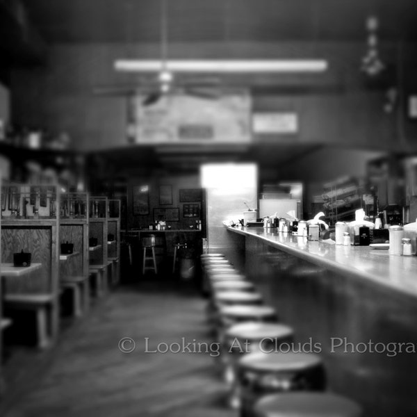 empty diner after hours art photo, vintage restaurant, diner counter, closed, black and white kitchen decor