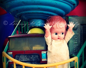 cute doll and old toys kitschy art photo, happy kewpie doll and colorful vintage toys, primary colors, nursery decor or for fun