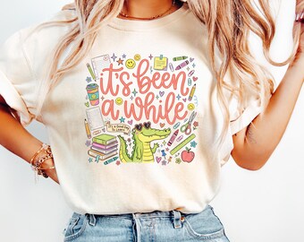 Comfort Colors  Back to School Teacher Shirt, It's Been a While Crocodile Shirt
