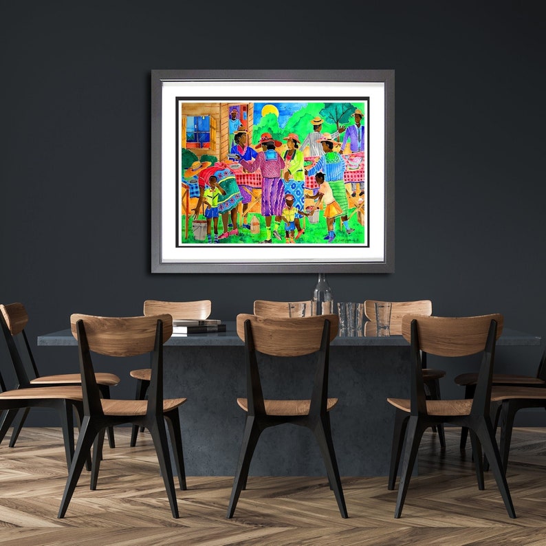 May include: A watercolor painting of a group of people gathered around a table outdoors. The people are all wearing colorful clothing and are smiling and laughing. The painting is framed in a silver frame.