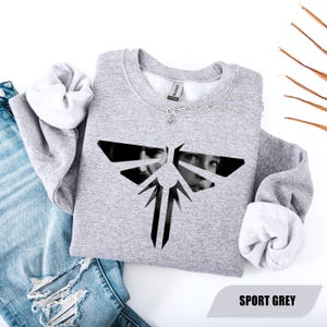 The Last Of Us Sweatshirt and Hoodie, Ellie and Joel Miller Graphic Sweater, Last Of Us For Fan Gifts, Last Of Us Clicker, Video Game Shirt