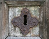 Rusty Keyhole on a Wooden Door, photograph