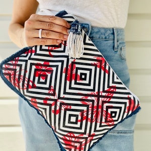 Geometric Black and White Clutch. Red Butterfly Design. Modern Fashion. Stripes.