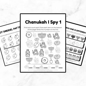 May include: Three black and white activity sheets with Chanukah-themed illustrations. The sheets feature the text "Chanukah I Spy 1", "Dot Dreidel Pattern", and "Which One Is Different?" with images of dreidels, menorahs, and donuts.