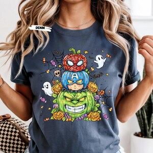 Get ready to turn heads this Halloween with our Stacked Superhero Pumpkin Shirt! 🎃💥 This fun and spooky fall tee features your favorite Marvel-inspired heroes — Spider-Man, Captain America, and Hulk — as adorable carved pumpkins stacked high in festive Halloween flair! 👻🕸️